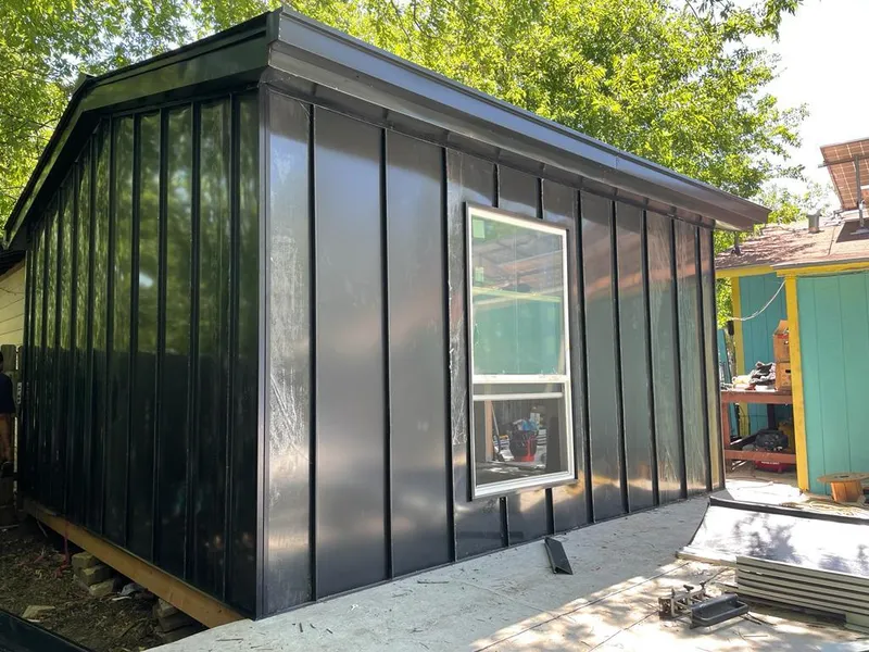 Black standing seam metal wall panels for Roof Inspection in West Dundee